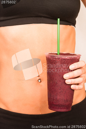 Image of Slender Female Torso Tanned Toned Body Blended Fruit Smoothie Dr