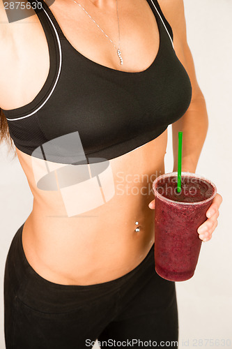 Image of Slender Female Torso Tanned Toned Body Blended Fruit Smoothie Dr