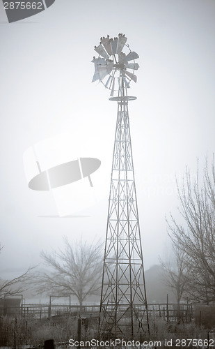 Image of Old Broken Windmill Now Serves as Birdhouse Ranch Farm