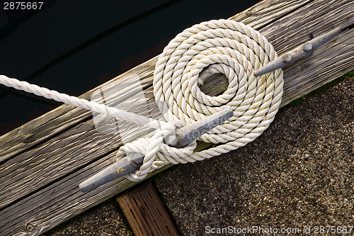 Image of Beautiful Swirled Curled Rope Boat Bow Line Nautical Tie Down