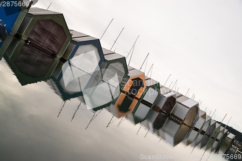 Image of Boat Houses Tight Row Cove Marina Settlement Puget Sound Bay 