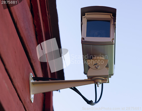 Image of Enclosed Professional Security System Video Camera Mounted Outsi