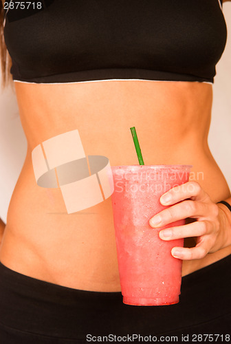 Image of Slender Female Torso Tanned Toned Body Blended Fruit Smoothie Dr