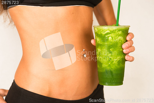 Image of Slender Female Torso Tanned Toned Body Blended Fruit Smoothie Dr