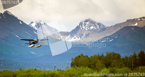 Image of Single Prop Airplane Pontoon Plane Water Landing Alaska Last Fro