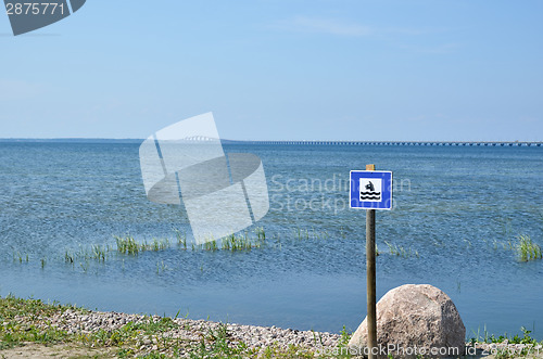 Image of Sign for dog bath beach 