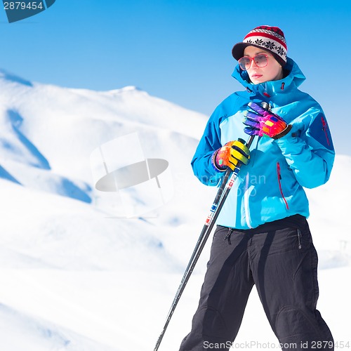 Image of Woman skier.