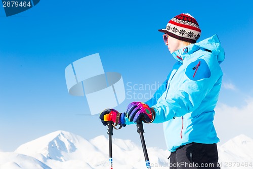 Image of Woman skier.