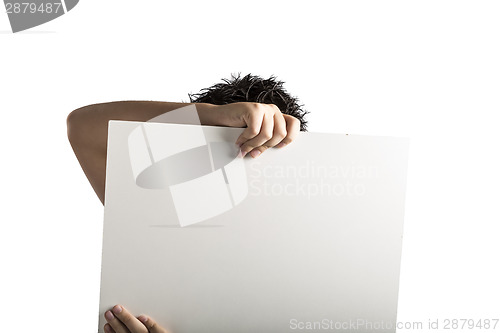 Image of White Plastic laminate sign held up by hands