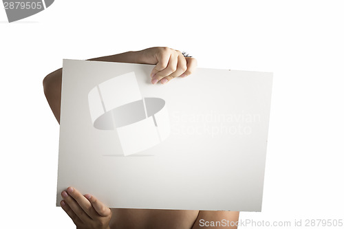 Image of White Plastic laminate sign held up by hands