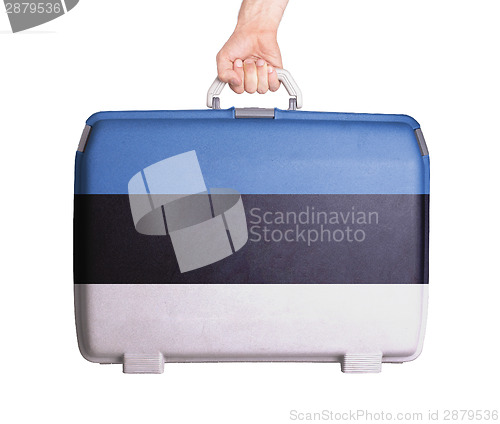 Image of Used plastic suitcase with stains and scratches