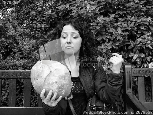 Image of Girl eating bread