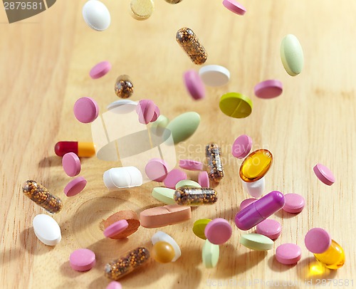 Image of various falling pills