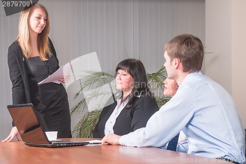Image of Pretty woman making a business presentation