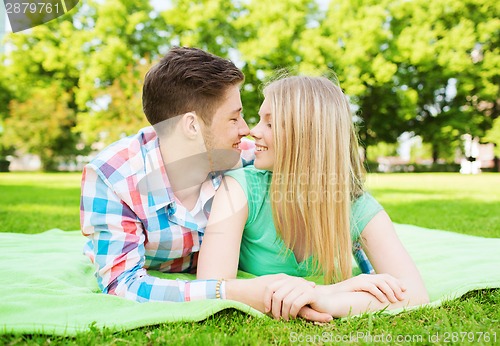 Image of smiling couple in park