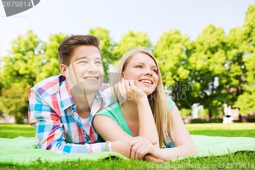 Image of smiling couple in park