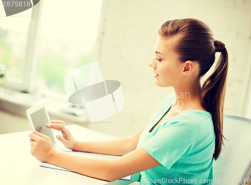 Image of attractive student girl using tablet pc