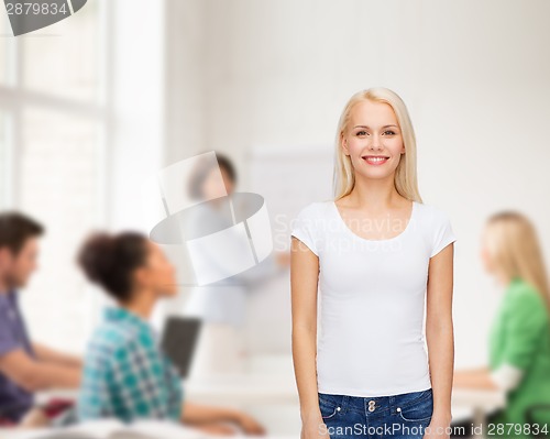 Image of smiling woman in blank white t-shirt