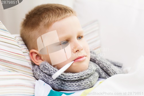 Image of ill boy with flu at home