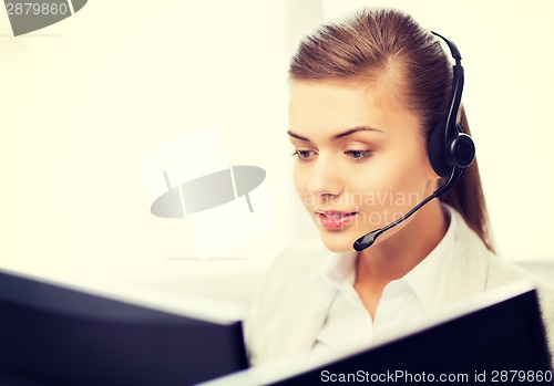 Image of friendly female helpline operator