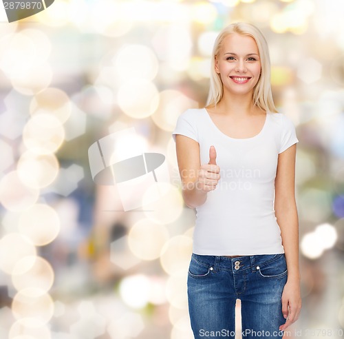 Image of woman showing thumbs up