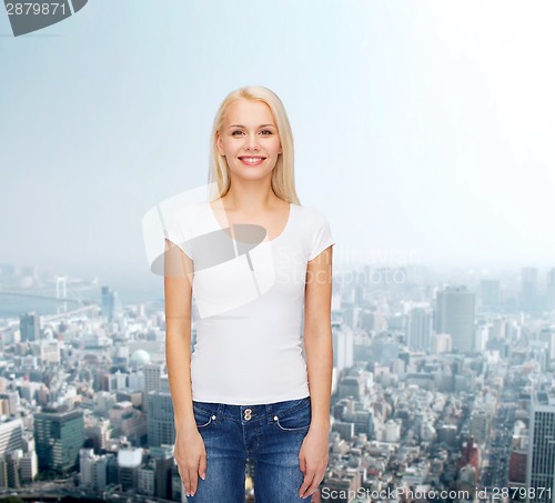 Image of smiling woman in blank white t-shirt