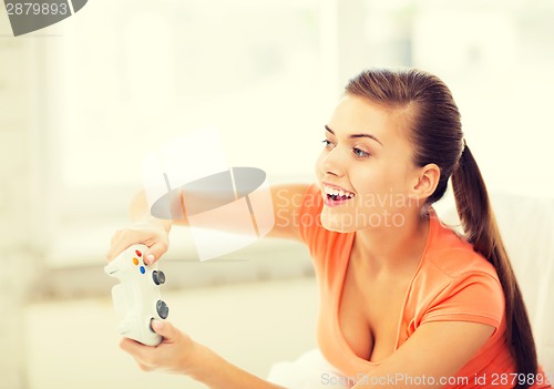 Image of woman with joystick playing video games