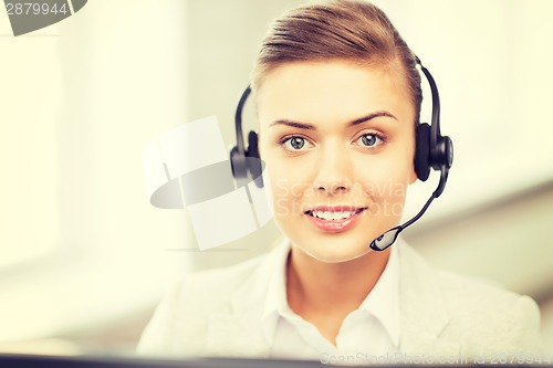 Image of friendly female helpline operator