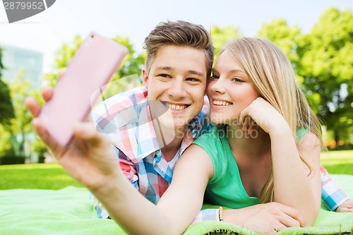 Image of smiling couple in park
