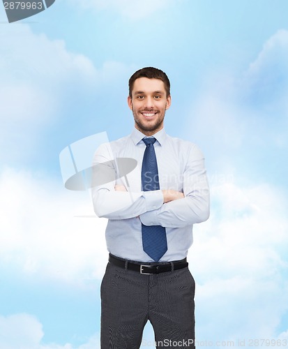 Image of handsome businessman with crossed arms