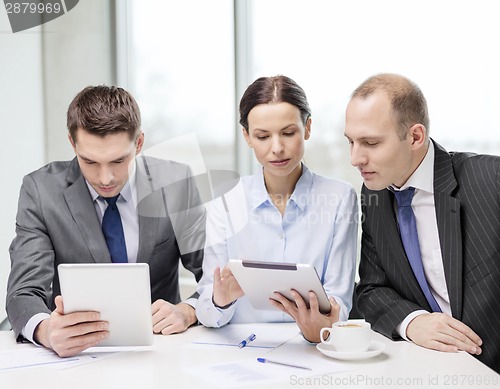 Image of business team with tablet pc having discussion