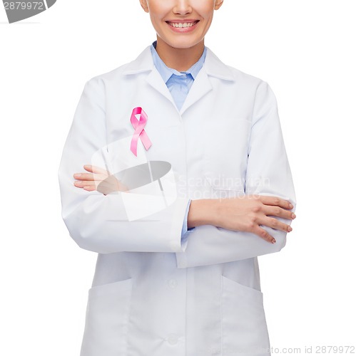 Image of female doctor with breast cancer awareness ribbon
