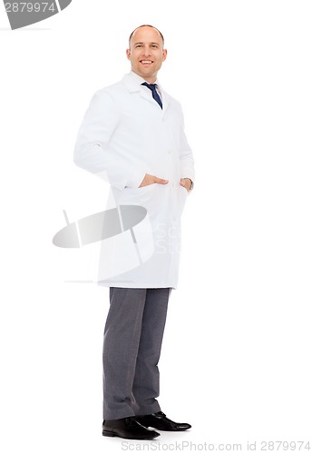 Image of smiling male doctor in white coat