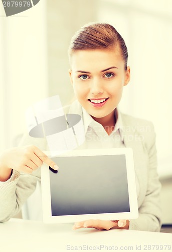 Image of businesswoman with tablet pc in office