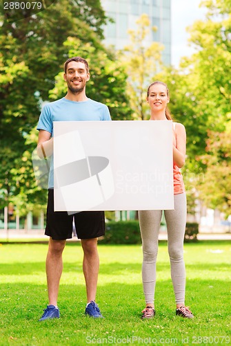 Image of smiling couple outdoors