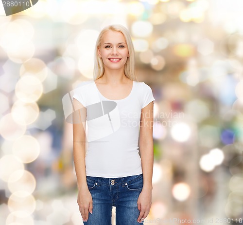 Image of smiling woman in blank white t-shirt