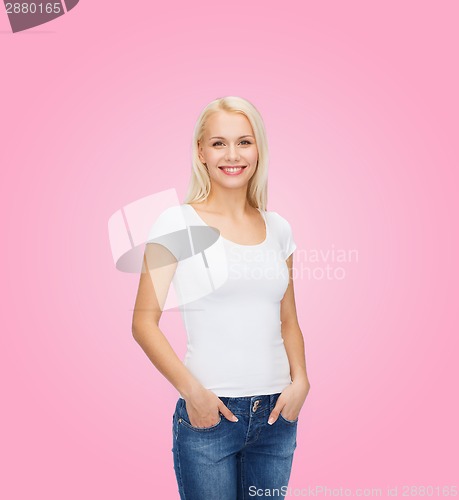 Image of smiling woman in blank white t-shirt