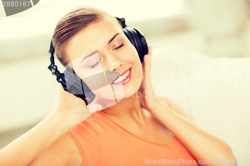 Image of woman with headphones