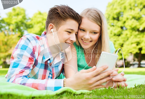 Image of smiling couple in park