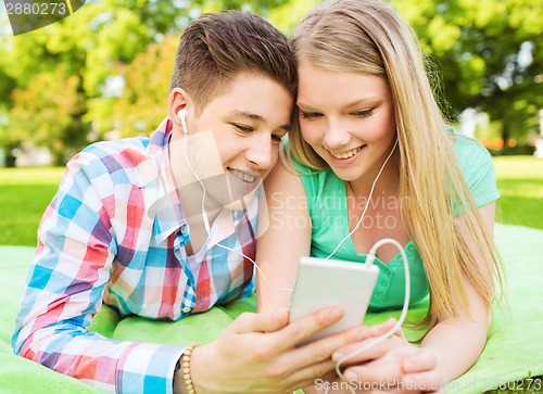 Image of smiling couple in park