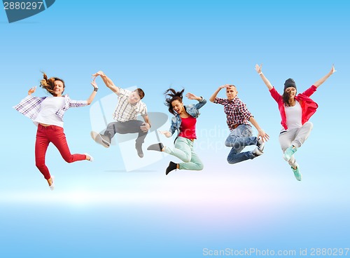 Image of group of teenagers jumping