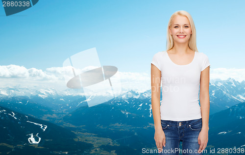 Image of smiling woman in blank white t-shirt