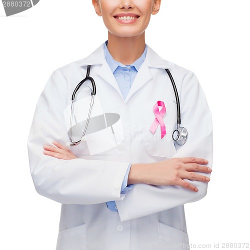 Image of female doctor with breast cancer awareness ribbon