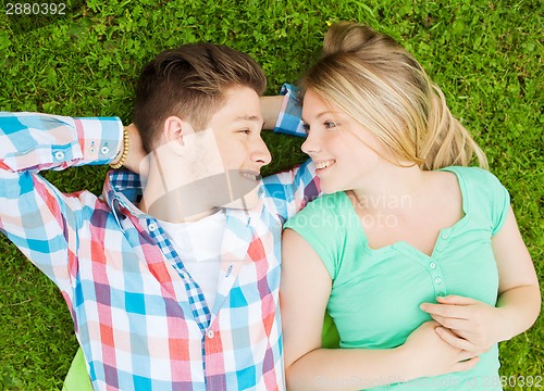 Image of smiling couple in park