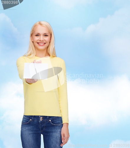 Image of smiling girl with blank business or name card