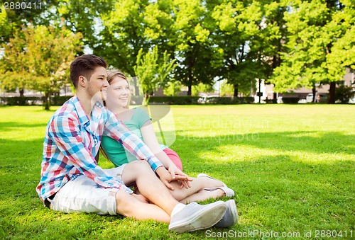 Image of smiling couple in park