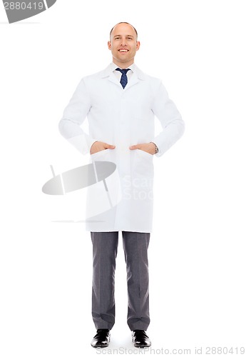 Image of smiling male doctor in white coat