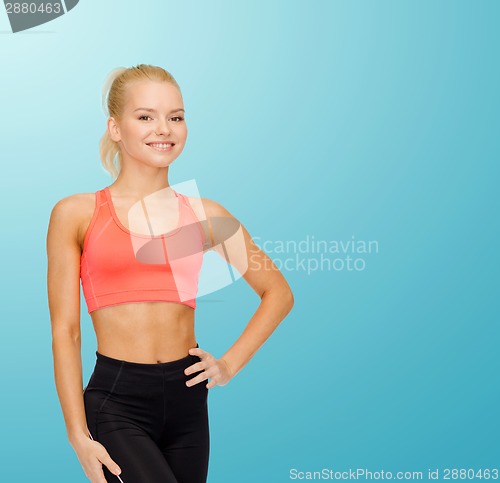 Image of beautiful athletic woman in sportswear