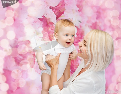 Image of happy mother with smiling baby