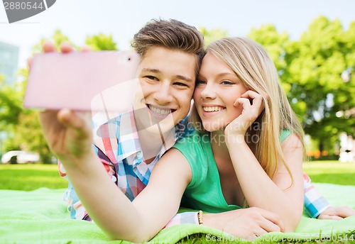 Image of smiling couple in park
